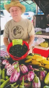  ?? Submitted photos ?? FARMERS MARKET: Vendor of the Week Betty Sutton and Farmer of the Week Lester Meredith regularly offer their goods during the Hot Springs Farmers &amp; Artisans Market, held Saturdays from 7 a.m. to noon at 121 Orange St.