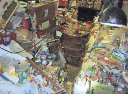  ?? MILWAUKEE DEPARTMENT OF NEIGHBORHO­OD SERVICES ?? This photo shows the kitchen of the Stank home in 2016. Ilona and Roger Stank were featured in the cable TV show “Hoarders.”