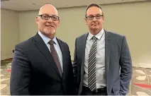  ??  ?? Mitsubishi Motors chief operating officer Trevor Mann, left, with newly appointed Mitsubishi NZ president and chief executive Warren Brown.