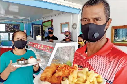  ?? Photo: Ronald Kumar ?? Cannibal Country restaurant owner William Danford with wife, Kafoa Danford and staff in Navua on July 19, 2021.