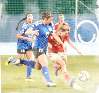  ?? PHOTOGRAPH COURTESY OF PFF ?? FILIPINAS players Alicia Barker (No. 17) and Quinley Quezada (No. 20) engage Wales in the Pinatar Cup in Murcia, Spain. Wales won, 1-0.