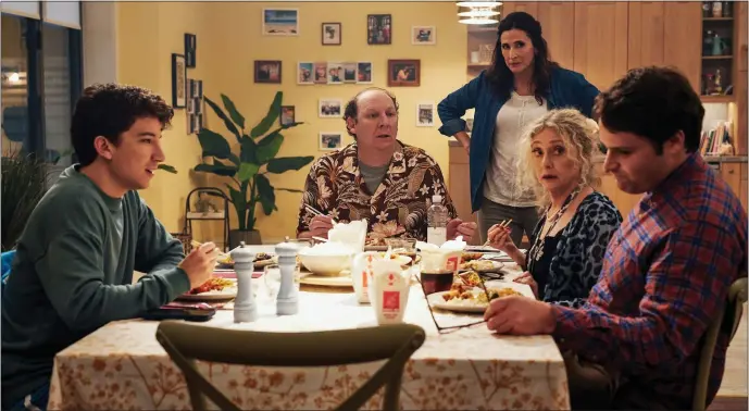  ?? PHOTO MARK JOHNSON — CBS ?? Daniel Thrasher as Gregg Langer, Dan Bakkedahl as Harvey Langer, Michaela Watkins as Jane Langer, Carol Kane as Nana, Henry Hall as David Langer, left to right, star in “Dinner With The Parents.”