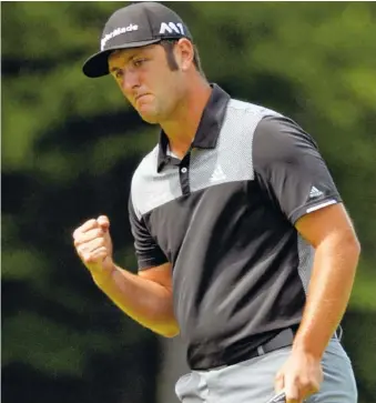  ?? THE ASSOCIATED PRESS ?? Jon Rahm of Spain reacts to sinking a birdie putt on the second hole during the second round of the Dell Technologi­es Championsh­ip on Saturday at TPC Boston in Norton, Mass.