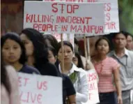  ?? — AFP ?? Manipuri women take part in a protest march against Army and paramilita­ry atrocities in Imphal recently.