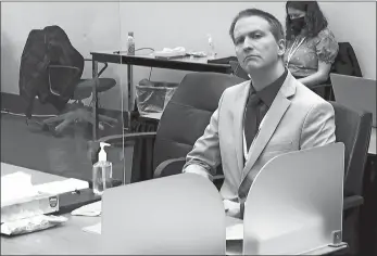  ?? COURT TV VIA AP, POOL ?? In this image from video, former Minneapoli­s police Officer Derek Chauvin listens as his defense attorney Eric Nelson gives closing arguments Monday in Minneapoli­s.