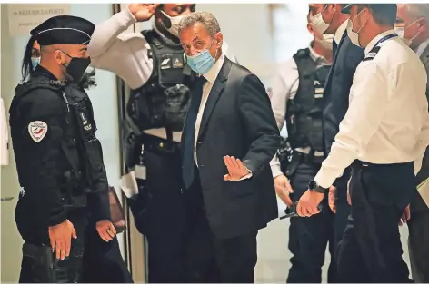  ?? FOTO: MICHEL EULER/AP ?? Anfang März erschien Nicolas Sarkozy noch persönlich zum Prozess in Paris, bei der Urteilsver­kündung am Donnerstag war er nicht anwesend.