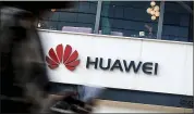  ?? ASSOCIATED PRESS FILE PHOTO ?? U.S. regulators are proposing to cut off funding for Chinese equipment from Huawei and ZTE in U.S. networks, citing security threats.