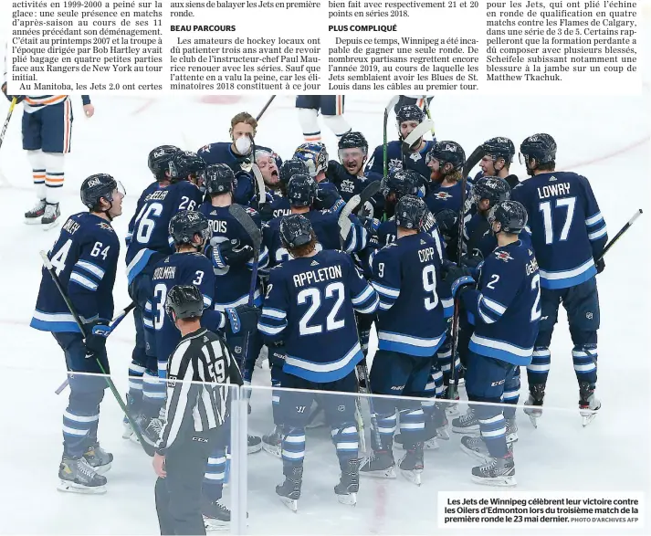  ?? PHOTO D’ARCHIVES AFP ?? Les Jets de Winnipeg célèbrent leur victoire contre les Oilers d’edmonton lors du troisième match de la première ronde le 23 mai dernier.