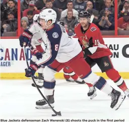  ??  ?? Blue Jackets defenseman Zach Werenski (8) shoots the puck in the first period against the Senatorson Friday in Ottawa. MARC DESROSIERS/USA TODAY SPORTS