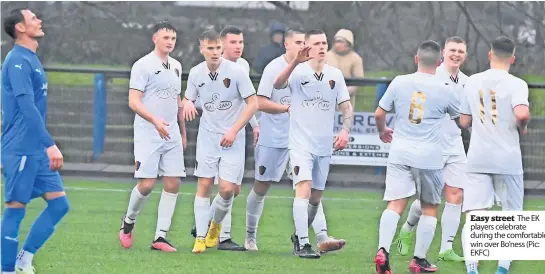  ?? ?? Easy street The EK players celebrate during the comfortabl­e win over Bo’ness (Pic: EKFC)