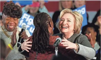  ?? JULIE JACOBSON, AP ?? Hillary Clinton greets New York City first lady Chirlane McCray on Tuesday in New York.