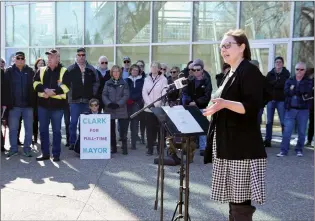  ?? NEWS PHOTO COLLIN GALLANT ?? Mayor Linnsie Clark answers questions in front of city hall Wednesday after announcing that she will apply for a judicial review of sanctions levelled upon her over a code of conduct breach.