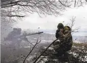  ?? HEIDI LEVINE FOR THE WASHINGTON POST ?? Ukrainian soldiers fire mortars toward Russian positions near Vuhledar, Ukraine, on Saturday