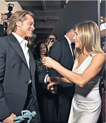  ??  ?? Together again? Brad Pitt and Jennifer Aniston at the Screen Actors Guild Awards on Sunday, above, and as a couple in 1999, left