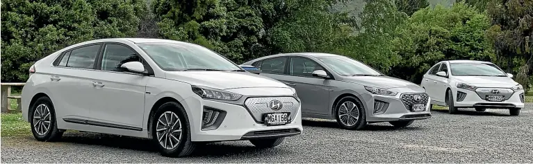  ?? DAVID LINKLATER/STUFF ?? A right grilling: The Ioniq plug-in in grey, flanked by two white Electric models.