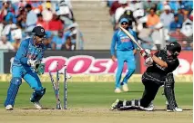  ?? AMIT DAVE ?? New Zealand’s Tom Latham is bowled for 38 in the second ODI in Pune.