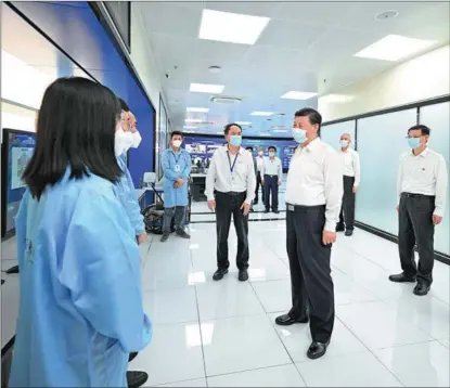  ?? XIE HUANCHI / XINHUA ?? President Xi Jinping, who is also general secretary of the Communist Party of China Central Committee and chairman of the Central Military Commission, visits Purple Mountain Laboratori­es in Nanjing, capital of Jiangsu province, on July 6.