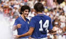  ?? Photograph: Action Plus/Shuttersto­ck ?? Paolo Rossi celebrates his second goal against Poland of the 1982 semi-final with Marco Tardelli.