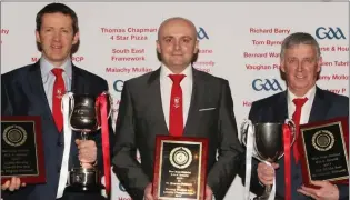  ??  ?? Jim Byrne, chairman of St Mogues Coiste na nÓg; Charlie Walsh, secretary St Mogues and John Hanton, chairman of St Mogues GAA with silverware won by both junior and adult teams in 2017.