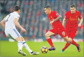  ?? Picture: GETTY IMAGES ?? KEY MAN: Liverpool’s Philippe Coutinho, centre, controls the ball during the Premier League match against Sunderland at Anfield. Coutinho will be expected to torment Manchester City today