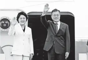  ?? HWANG KWANG-MO/AP ?? South Korean President Moon Jae-in and his wife, Kim Jung-sook, leave for the United States to confer with President Trump.