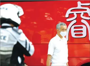  ?? AFP ?? Singapore’s Prime Minister Lee Hsien Loong, the secretary-general of the ruling People’s Action Party, arrives at the nomination centre ahead of July’s general election on June 30.