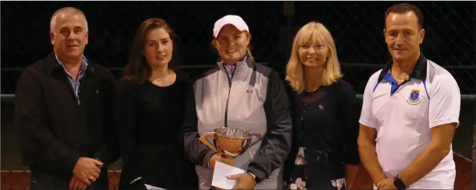  ??  ?? Ladies Singles finalists Alexandra Pickerill (runner-up) and Ashley Wynne – champion for the 19th year in a row – with sponsor John Sinnott, captain Jean Baker and president Robert Earls.