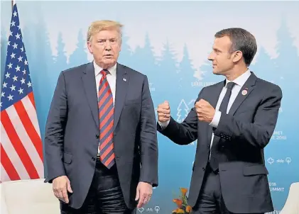  ?? AFP ?? Gesto. Donald Trump y Emmanuel Macron, en una reunión en el marco del G7, en Canadá, semanas atrás.