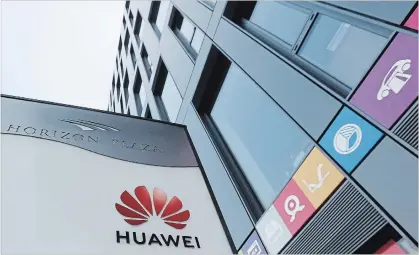  ?? CZAREK SOKOLOWSKI THE ASSOCIATED PRESS ?? The Huawei logo displayed at the main office of Chinese tech giant Huawei in Warsaw, Poland, on Friday.