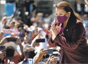  ?? Moises Castillo Associated Press ?? PRESIDENT Xiomara Castro, pictured at her inauguarat­ion in Tegucigalp­a in January, said Honduras was “recovering its sovereignt­y ” by rejecting a plan to create self-governing zones for foreign investors.