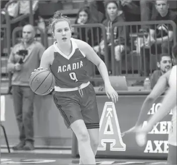  ?? PETER OLESKEVICH PHOTO ?? Acadia Axewoman and former Horton H.S. star Jayda Veinot looks down court in offensive transition.