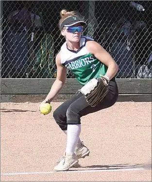  ?? PHOTO BY VICKY SHEA ?? Lady Warrior Jessica Hoyt looks to throw from her third base position in a recent 22-5 victory over Golden Valley. Hoyt had a standout game at the plate against the Bulldogs, going 3-3 with a homerun, triple, three runs scored and four RBIs.