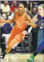  ?? SEAN D. ELLIOT / Associated Press ?? Sun guard Jasmine Thomas drives by Lynx guard Lindsay Whalen during a game on Aug. 17 in Uncasville.