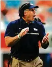 ?? ROB FOLDY / GETTY IMAGES ?? “We’ve got to try to keep it (UM’s turnover chain) in that box,” Pittsburgh coach Pat Narduzzi says.