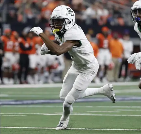  ?? Ap file ?? FOXBORO-BOUND: Baylor wide receiver Tyquan Thornton advances the ball after a catch during the first half of the Big 12 Championsh­ip game against Oklahoma State in Arlington, Texas, on Dec. 4.