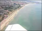  ??  ?? Dunkirk’s beaches and the port in the distance as seen from the air