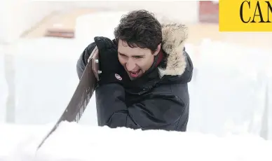  ?? SEAN KILPATRICK / THE CANADIAN PRESS ?? Prime Minister Justin Trudeau visits the Snow Castle on Yellowknif­e Bay in Yellowknif­e, N.W.T., on Friday. Trudeau held a town-hall meeting Thursday and will head to Washington Monday to meet with U.S. President Donald Trump.