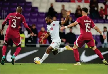  ?? ?? ±
Players of Qatar and Canada in action during their friendly match on Friday.