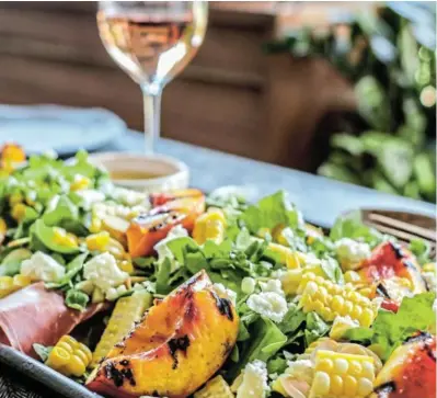  ?? /PHOTOS / SUPPLIED ?? Summer food and wine pairing for Muscat, rosé, or extra-dry sparkling wine: Grilled Nectarine Salad with Arugula, Prosciutto, and Corn.