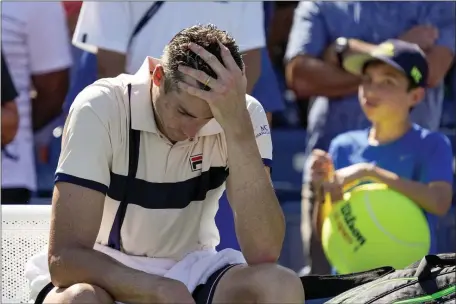  ?? JOHN MINCHILLO — THE ASSOCIATED PRESS ?? John Isner, of the United States, reacts after losing to Michael Mmoh, of the United States, during the second round of the U.S. Open tennis championsh­ips, Thursday, Aug. 31, 2023, in New York.