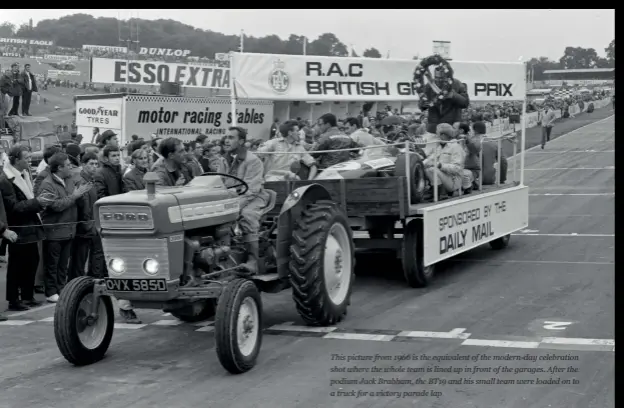  ??  ?? This picture from 1966 is the equivalent of the modern-day celebratio­n shot where the whole team is lined up in front of the garages. After the podium Jack Brabham, the BT19 and his small team were loaded on to a truck for a victory parade lap