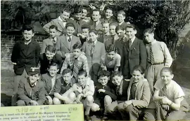  ??  ?? Far left: Freddie Durst and his wife Marion. Above: the Kindertran­sport group at Freddie’s hostel. Centre left: Freddie’s identity card permitting him to enter the UK as a child. Below: Kindertran­sport children at their Dovercourt Bay camp