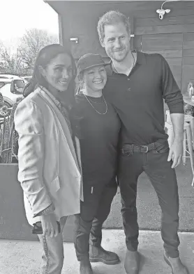  ?? PROVIDED BY LA BARBECUE ?? Prince Harry and Meghan visit La Barbecue in Austin and pose for a photo with owner Ali Clem.