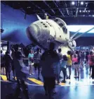 ?? FLORIDA TODAY ?? Kennedy Space Center guests view the shuttle Atlantis.