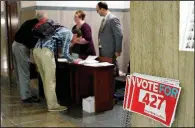  ?? AP/NATI HARNIK ?? are stacked outside a public hearing in Lincoln, Neb., for Initiative 427, the Medicaid Expansion Initiative.