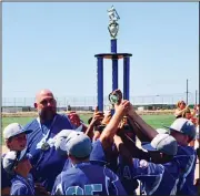  ?? COURTESY PHOTO ?? Members of the Lodi AllStars 10 and under baseball team hold up their first play trophy from winning the Cal Ripken District 1 Tournament title last weekend.