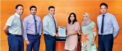  ??  ?? From left: Myfees Director – Jith Seneviratn­e, HNB Lead – Merchant Services & Digital Pay Products, Nawaf Munaver, HNB Deputy General Manager- Retail and SME Banking, Sanjay Wijemanne, Myfees Director - Malka Mutaliph, Myfees Director –Habeera Saleem and Myfees Director - Faiq Faaiz