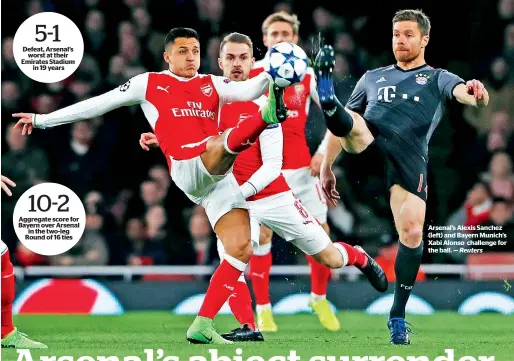  ?? Reuters ?? Arsenal’s Alexis Sanchez (left) and Bayern Munich’s Xabi Alonso challenge for the ball. —
