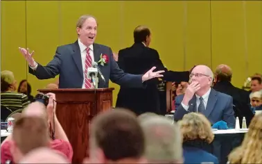  ?? TIM MARTIN/THE DAY ?? Dr. Michael Morosky, chairman of the OB/GYN Department at Johnson Memorial Hospital in Stafford Springs, receives the Norwich Native Son Award from the Norwich Rotary Clubs and the Women’s City Club, at the Norwich Holiday Inn on Wednesday.