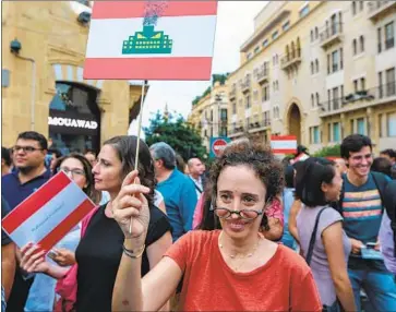  ?? Nabil Mounzer EPA/Shuttersto­ck ?? PROTESTERS in Beirut rally against government plans to install incinerato­rs capable of handling the 800 tons of garbage the city produces each day. Experts warn incinerato­rs could simply belch toxins into the air.